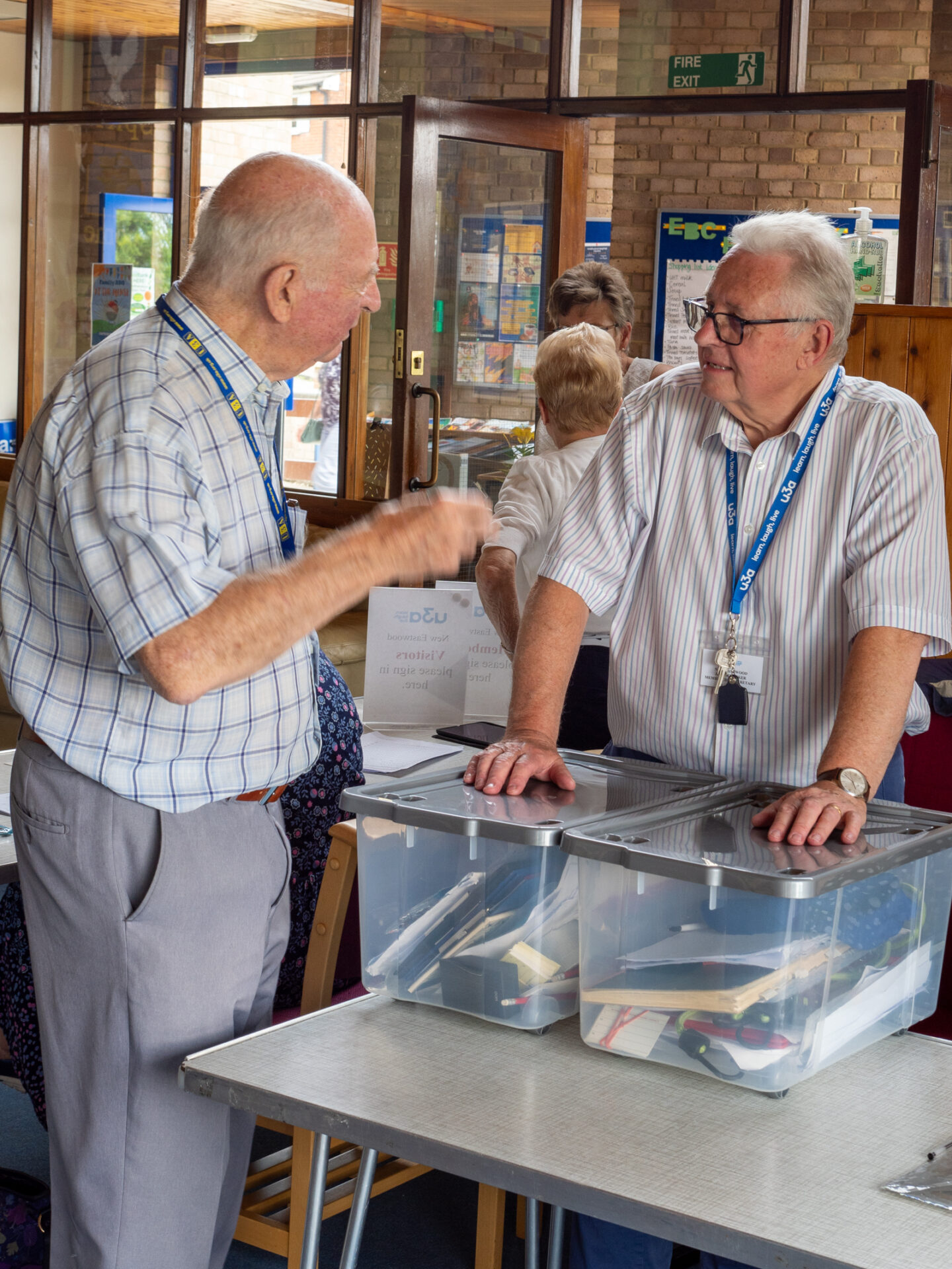 Two committee members chatting